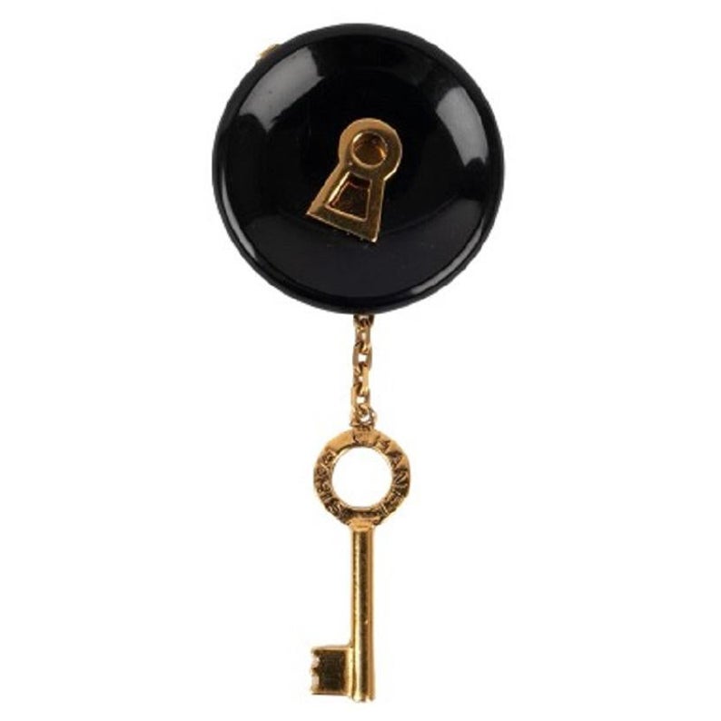 Chanel Black Bakelite and Golden Metal Brooch, 1999 For Sale