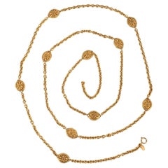 Chanel Necklace/sautoir in Golden Metal Composed of a Fine Chain and Medallions