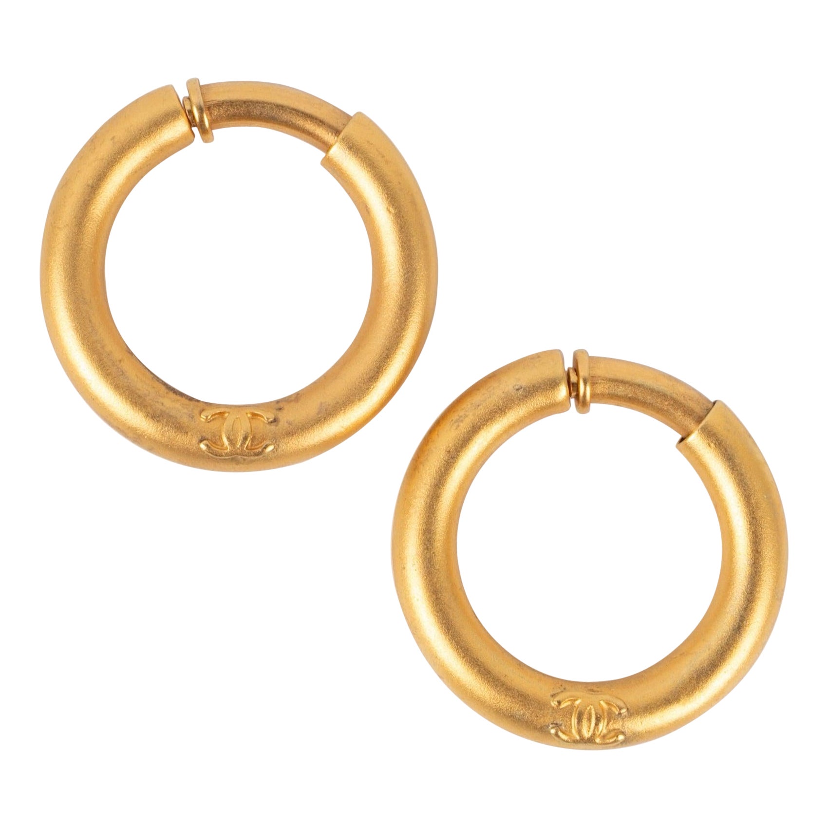 Chanel Golden Metal Round Earrings, 1996 For Sale
