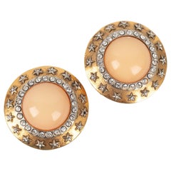 Chanel Round Clip-on Earrings in Golden Metal and Rhinestones