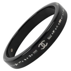 Chanel Black Bakelite Bracelet Embedded with Rhinestones, 2010