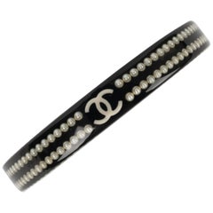 Chanel Black Bakelite Bracelet Embedded with Costume Pearls, 2010