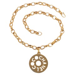COCO Chanel Golden Metal Necklace with Openwork Pendant, 1990s