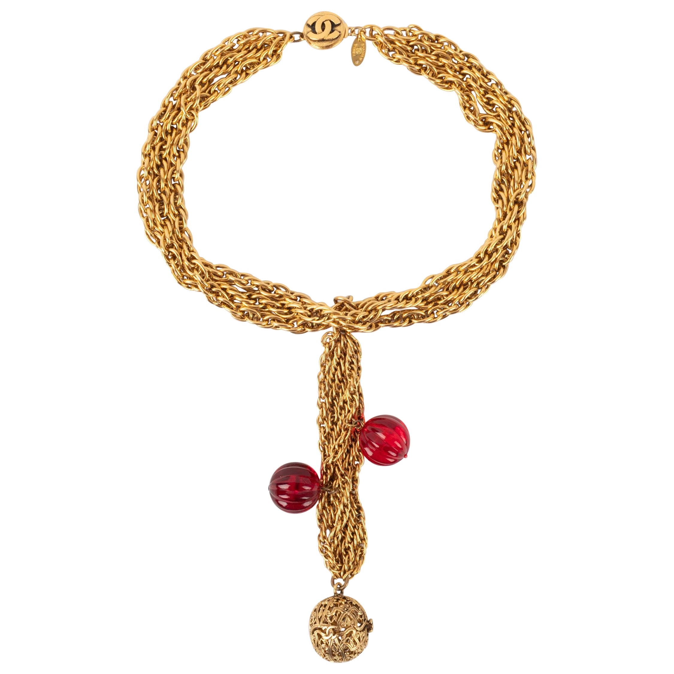 Chanel Golden Metal Necklace with Red Pearls, 1984 For Sale
