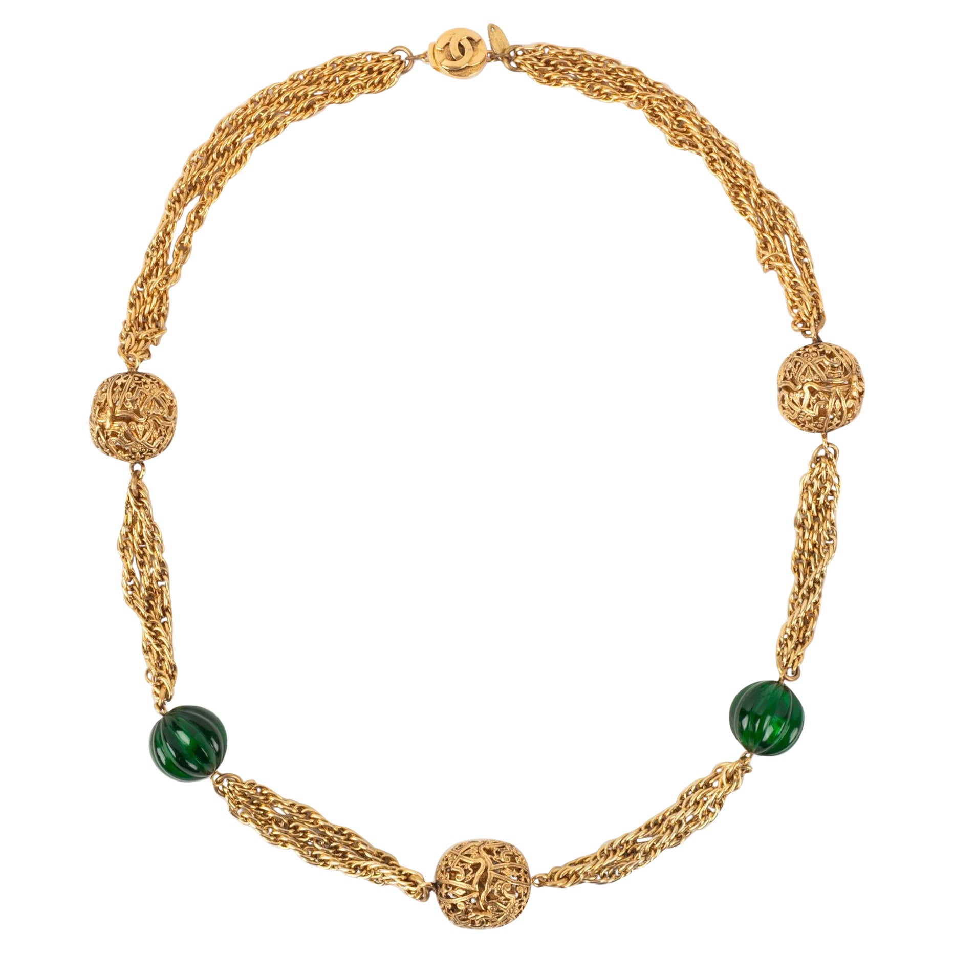 Chanel Golden Metal Necklace with Green Pearls, 1984 For Sale