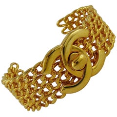 Chanel Used 1997 CC Turnlock and Chains Gold Toned Cuff Bracelet