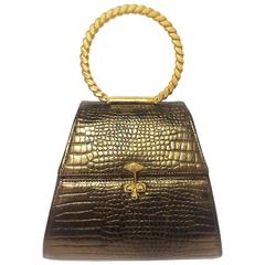Retro Charles Jourdan bronze gold croc embossed leather vanity bag.