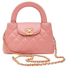 Chanel Glänzende Mini Kelly Einkaufstasche 2023 aus gealtertem Kalbsleder Koralle Rosa