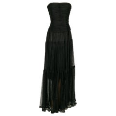 Chanel - Robe longue à bustier en tissu noir doublé de soie