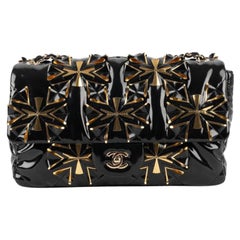 Chanel Schwarzes und goldenes flexibles Lackleder Timeless Tasche, 2019