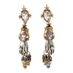 Alexander Mc Queen Boucles d'oreilles en métal doré et argenté ornées de strass