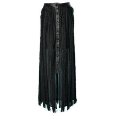 Black long skirt made of leather, soft tulle and threads fringes Augustin Teboul
