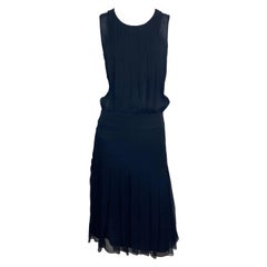 Chanel 2006C Schwarzes ärmelloses Kleid aus Seide und Chiffon ohne Ärmel-Größe 40