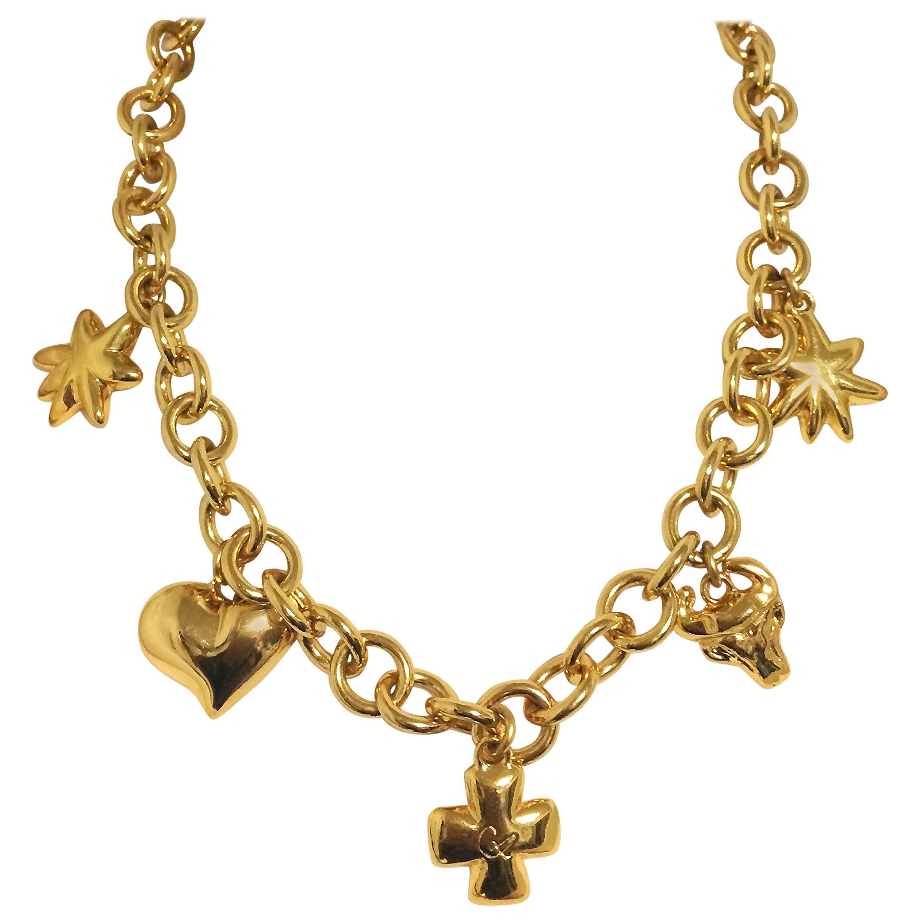 Vintage Christian Lacroix statement necklace with heart mark, star, clover, bull. For Sale