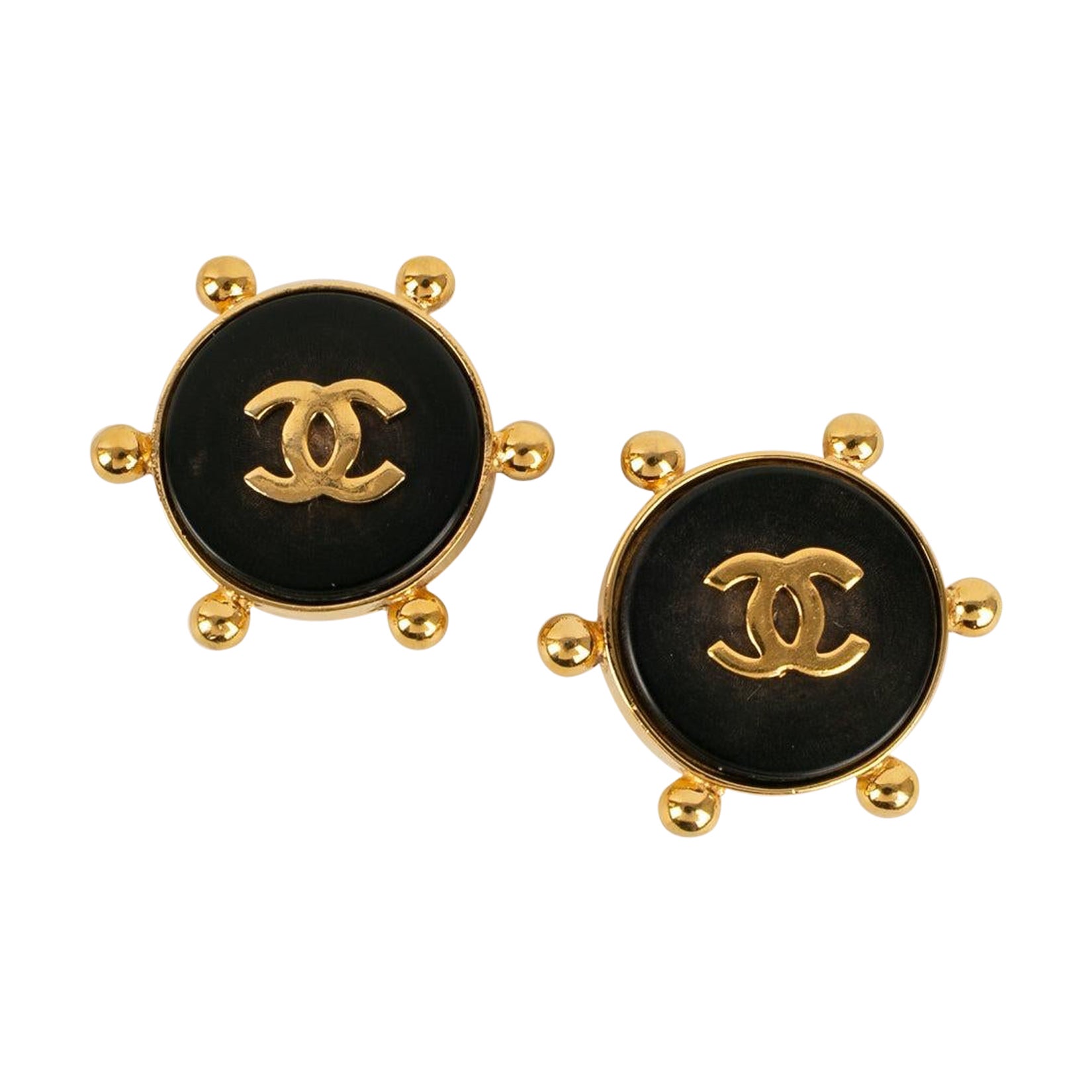 Chanel Earrings in Golden Metal and Black Bakelite For Sale