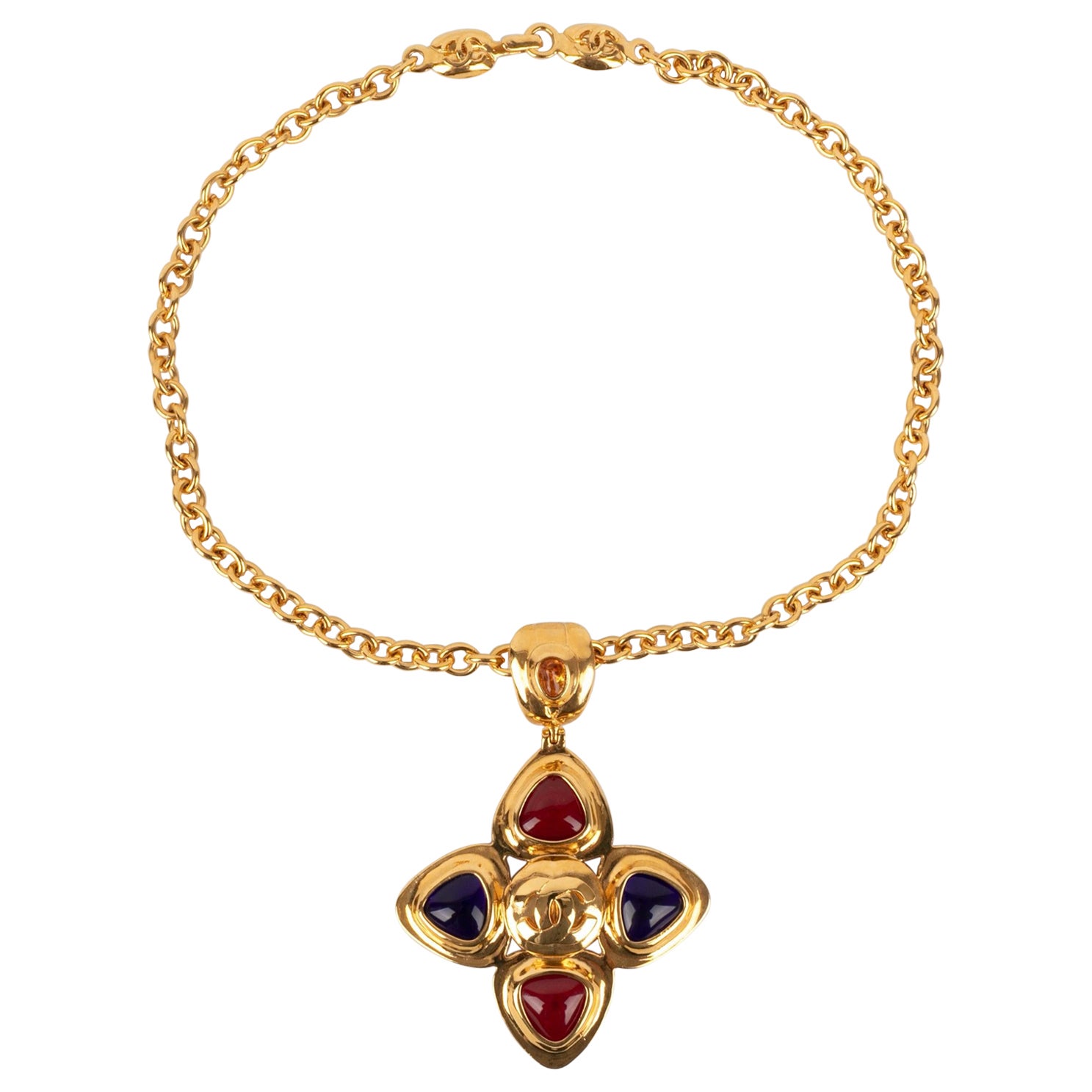 Chanel Golden Metal Necklace with a Blue and Red Glass Paste Pendant, 1997