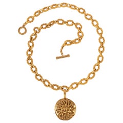 Vintage Chanel Golden Metal Necklace with a Sun Pendant, 1993