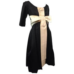 1950s Black Silk Cocktail Dress with Cream Silk Empire Bow Detail