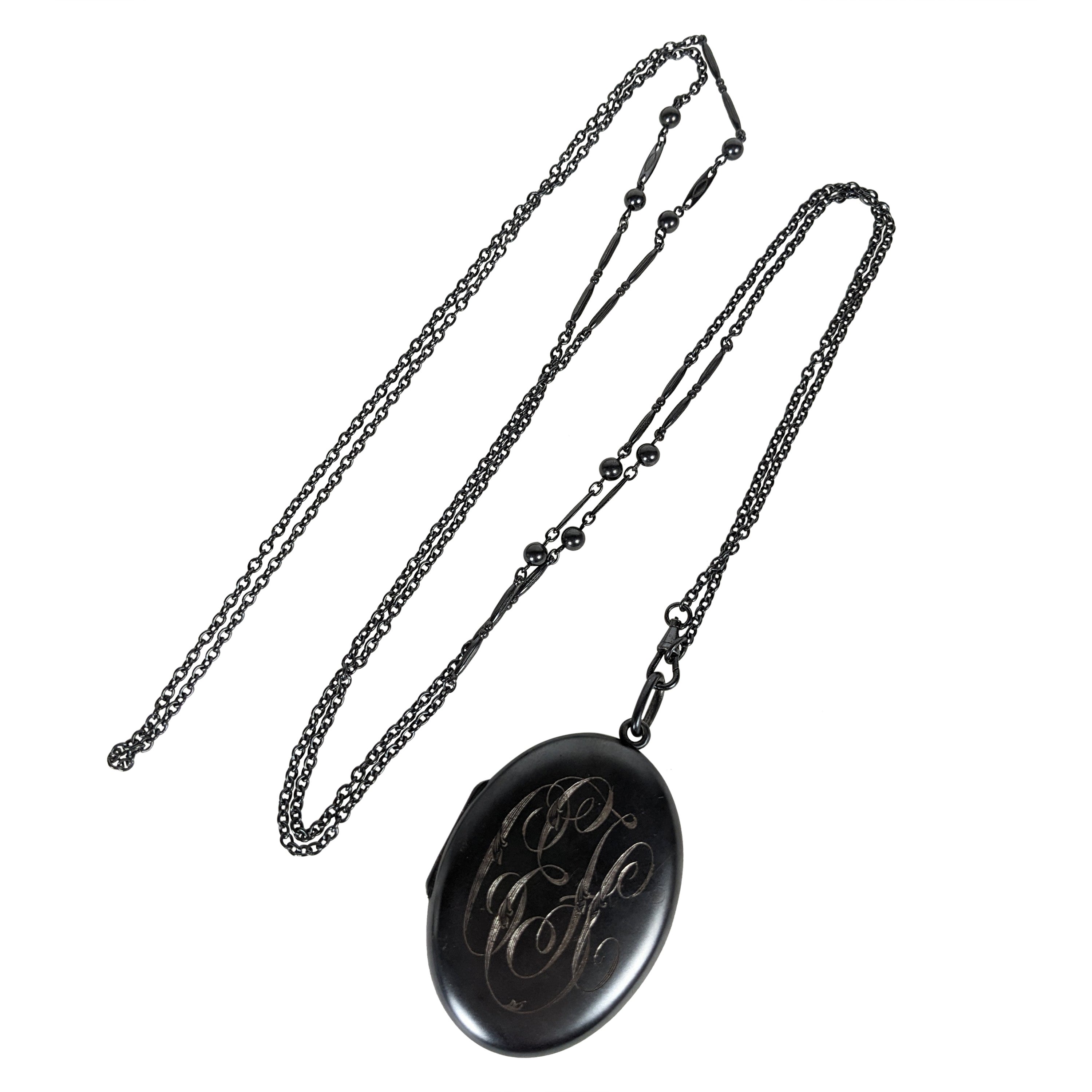 Victorian Gunmetal Locket and Long Chain For Sale