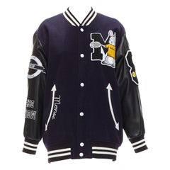 Monse bomber oversize letterman nero in lana navy con maniche varsity S