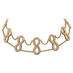 Antique Charming 'figure of eight' design Edwardian gilt and paste choker necklace 