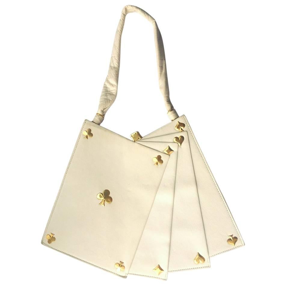 Exquisite Anne-Marie of Paris white leather and gilt 'Hand of Cards' handbag.