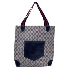 Sac de shopping Gucci vintage en toile bleue à poche frontale avec monogramme