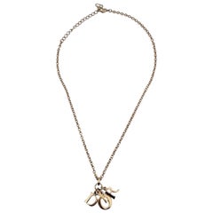 Christian Dior Gold Metal Dangling Letters Logo Necklace