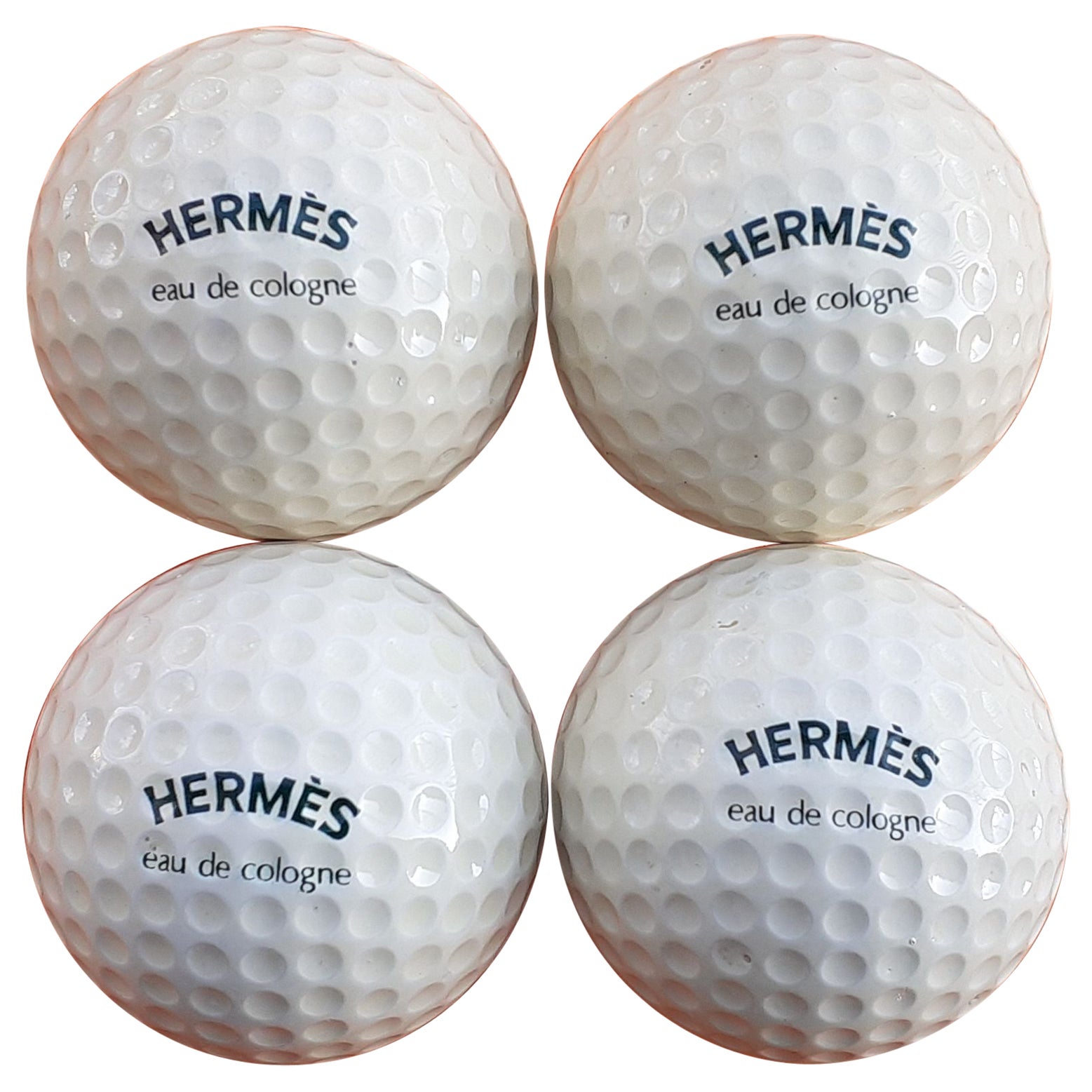 Rare jeu de 4 balles de golf Hermès