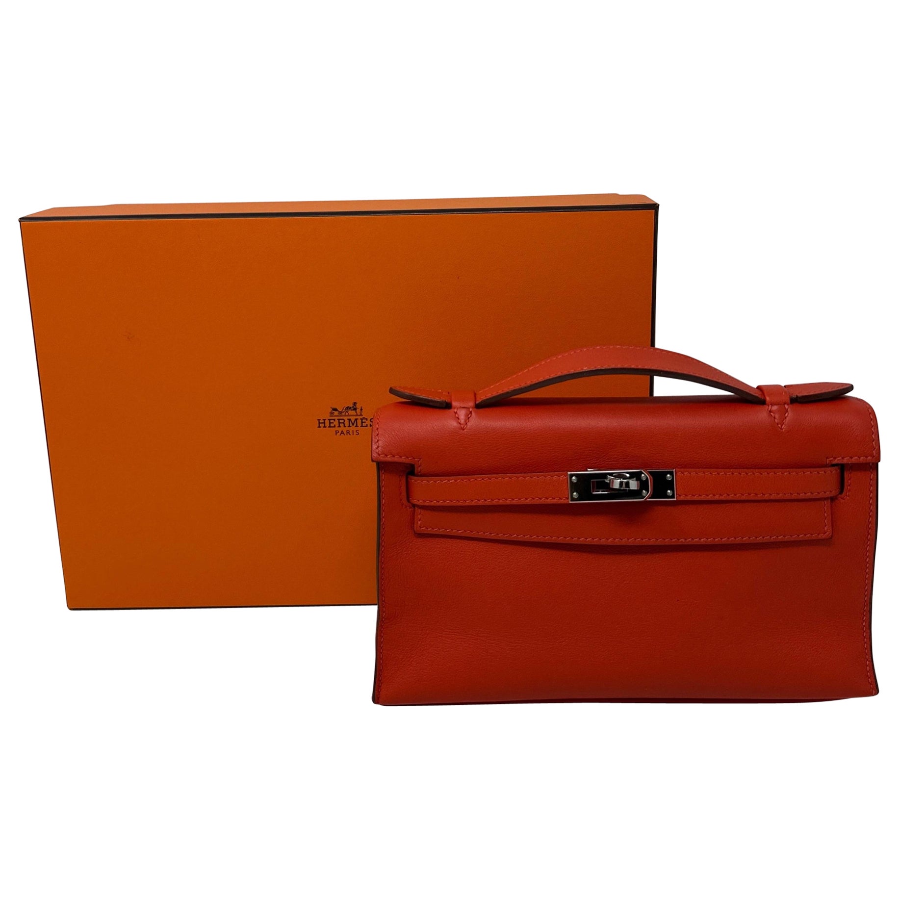 Hermes Kelly Orange Pochette im Angebot