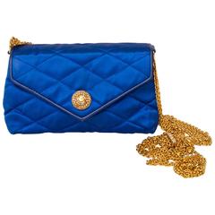An 80s Glamorous Chanel Quilted Blue Satin Evening Bag