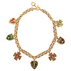 Conjunto de joyas de metal dorado Yves Saint Laurent
