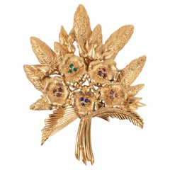 Dior Broche fleur en métal plaqué or avec strass colorés