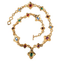 Collar de metal dorado con cabujones de pasta de vidrio Yves Saint Laurent