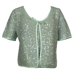 Set Chritistian Dior composto da top e gilet a maniche corte