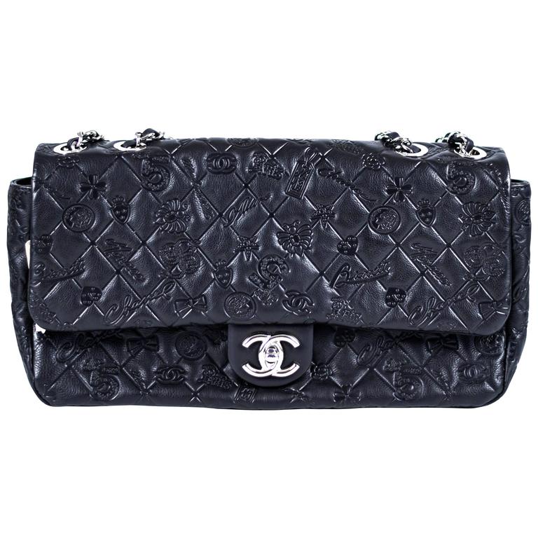 This Chanel Lucky Symbols Pouch is embossed with charms such as