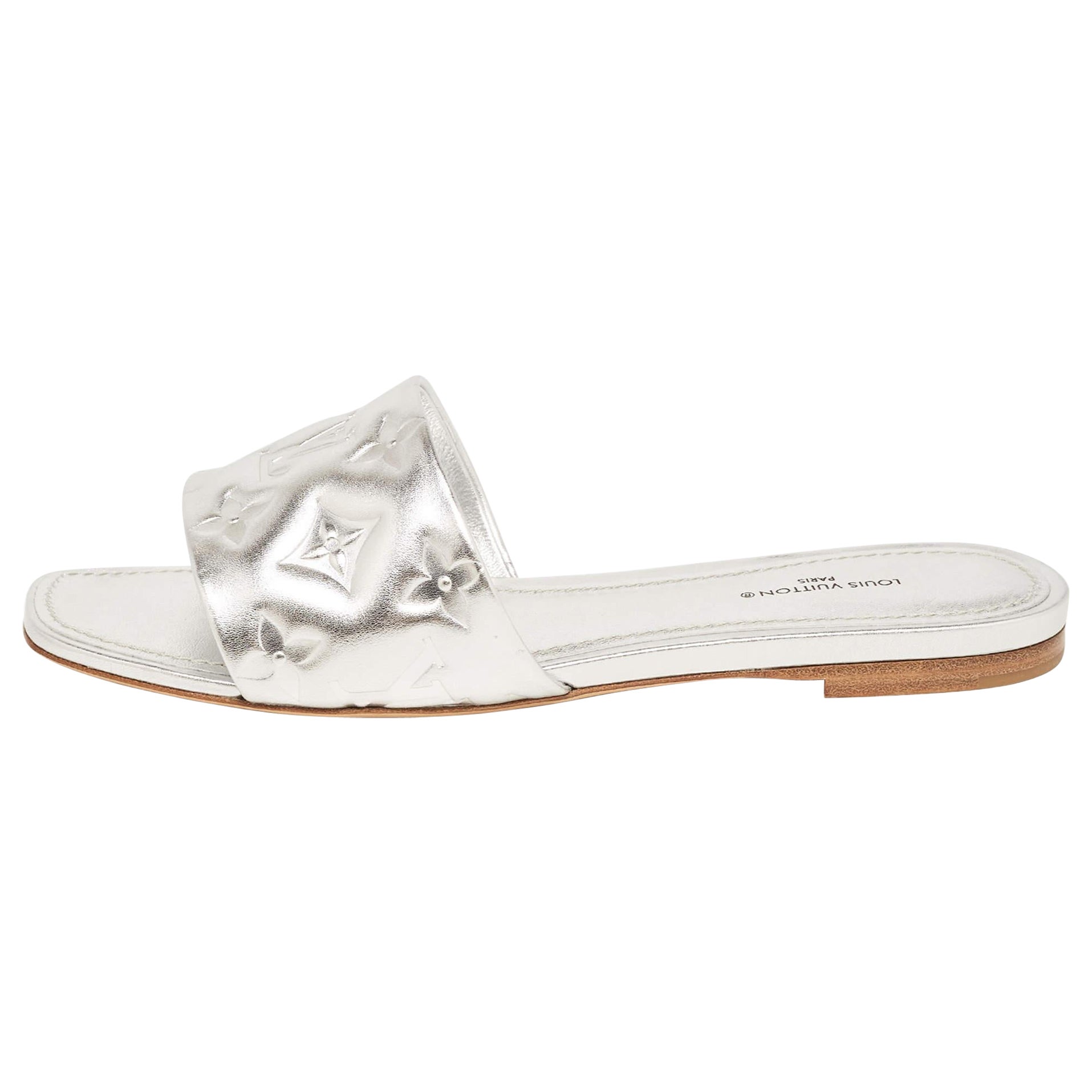 Enhance your casual looks with a touch of high style with these designer slides.