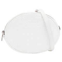 FERIDA YANG Emma white matte scaled leather oval crossbody belt bag