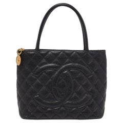 Chanel Black Quilted Caviar Leather Medallion Bag