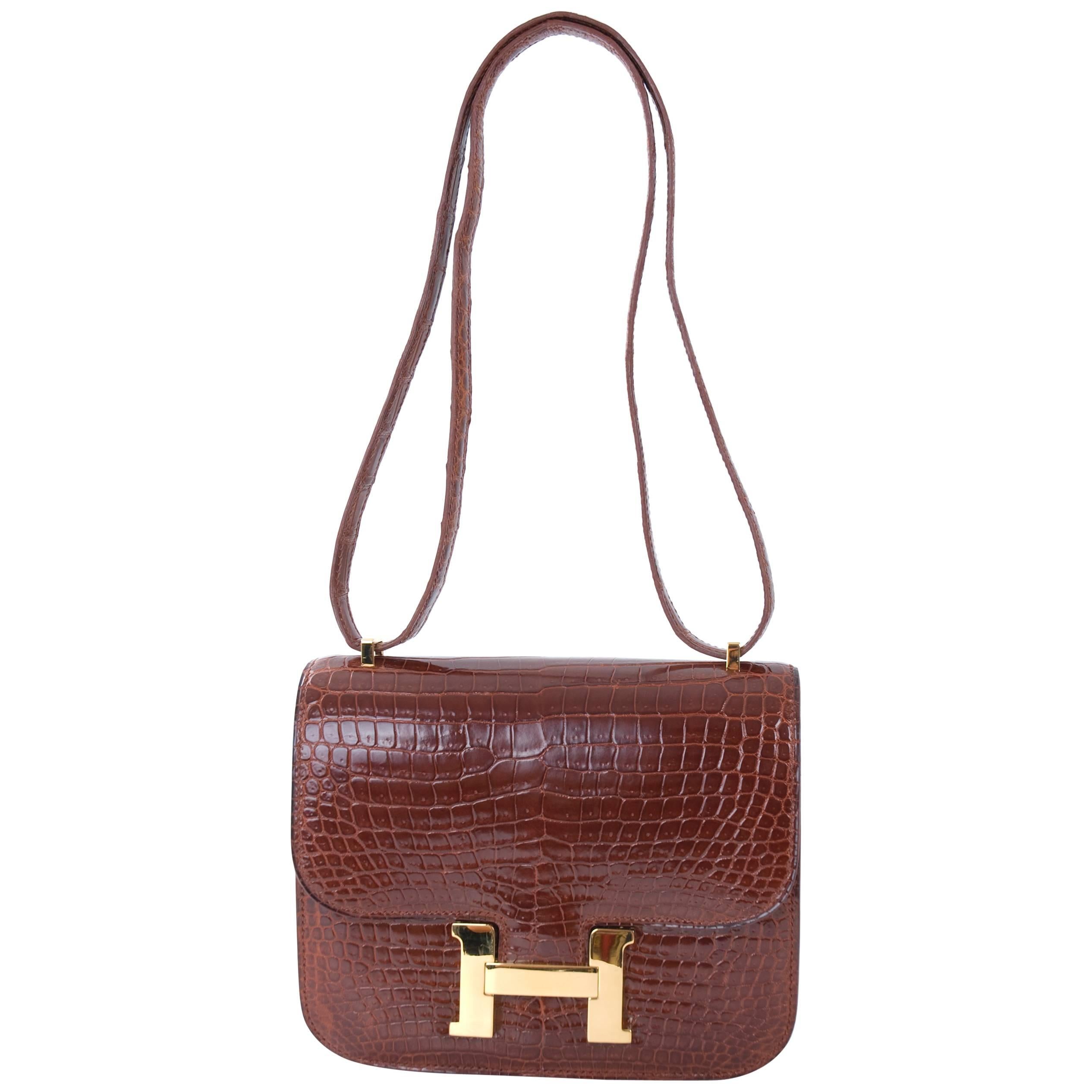 Hermes 18cm Mini Constance Bag Double Gusset Shiny Porosus Crocodile in Cognac For Sale