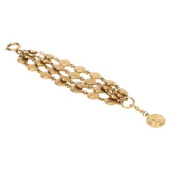 Chanel, bracelet à breloques CC plaqué or, années 70
