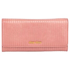 Portefeuille continental en cuir matelassé Miu Miu rose