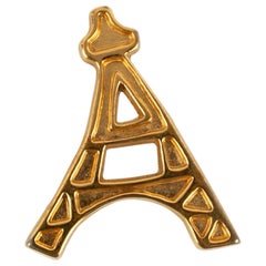 Vintage Yves Saint Laurent Eiffel Tower Brooch in Gold-Plated Metal