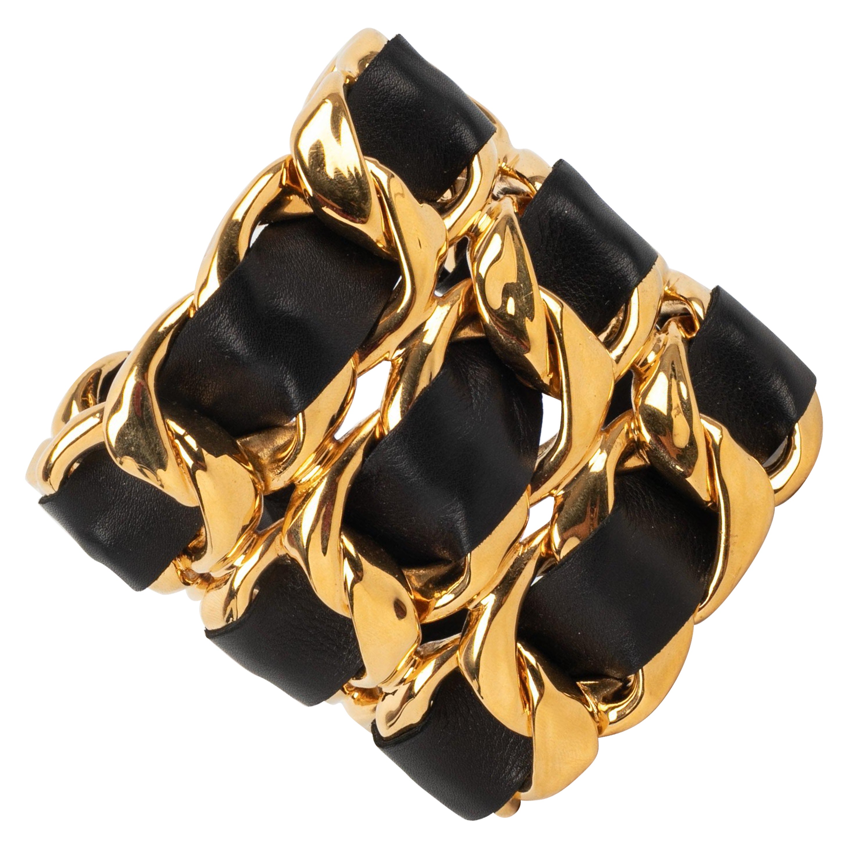 Chanel Cuff Bracelet in Golden Metal with Black Leather, 1980s For Sale