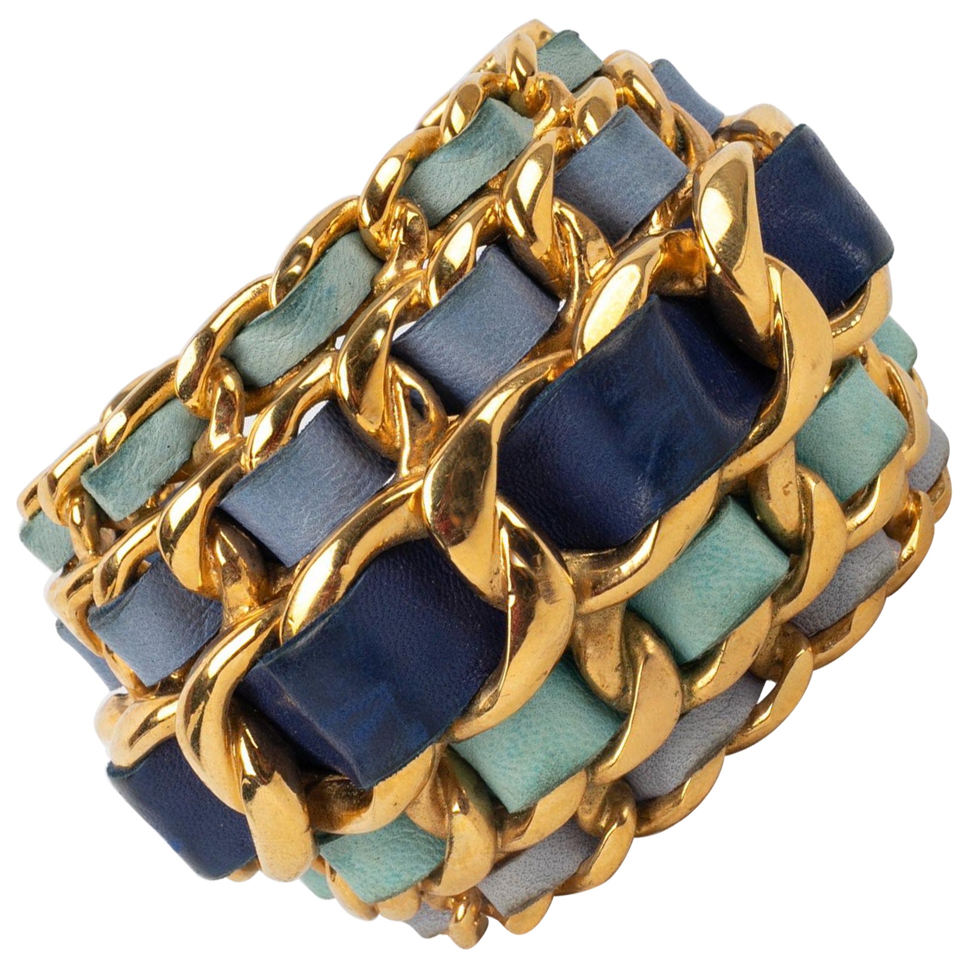 Chanel Cuff Bracelet in Golden Metal Interlaced with Blue Tone Leather, 1991 For Sale