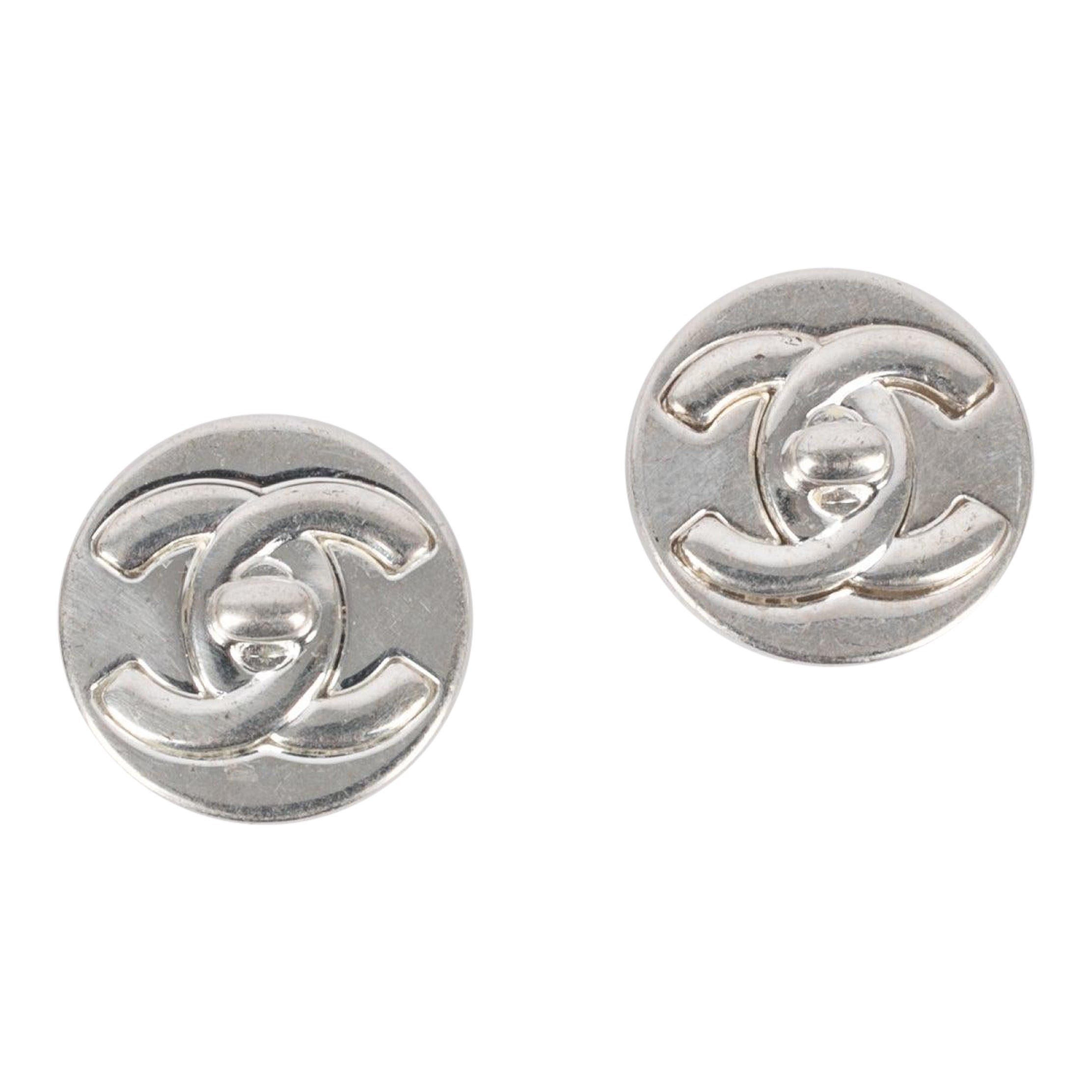 Chanel Silvery Metal Turnlock Circular Earrings, 1997
