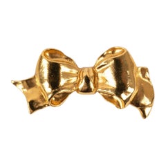 Vintage Chanel Bow Brooch in Gold-Plated Metal Representing a Bow, 1990s