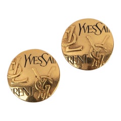 Yves Saint Laurent Goldene Metall-Ohrclips aus Metall, 1990er Jahre