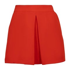 Alexander McQueen McQ mini-jupe orange à plis carrés, taille XXS