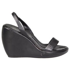 Prada Schwarze Leder-Keilsandalen mit Slingback-Rücken Größe IT 37,5